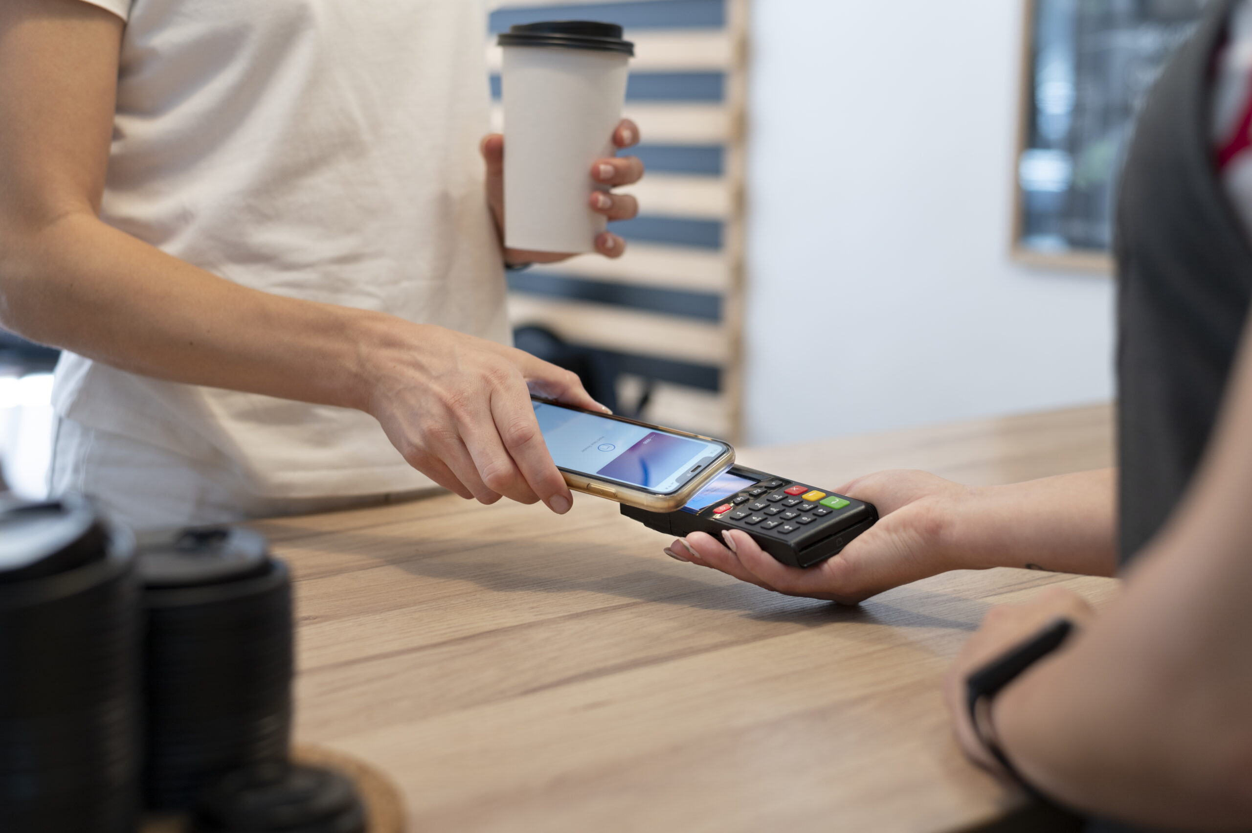 person-paying-with-its-smartphone-wallet-app