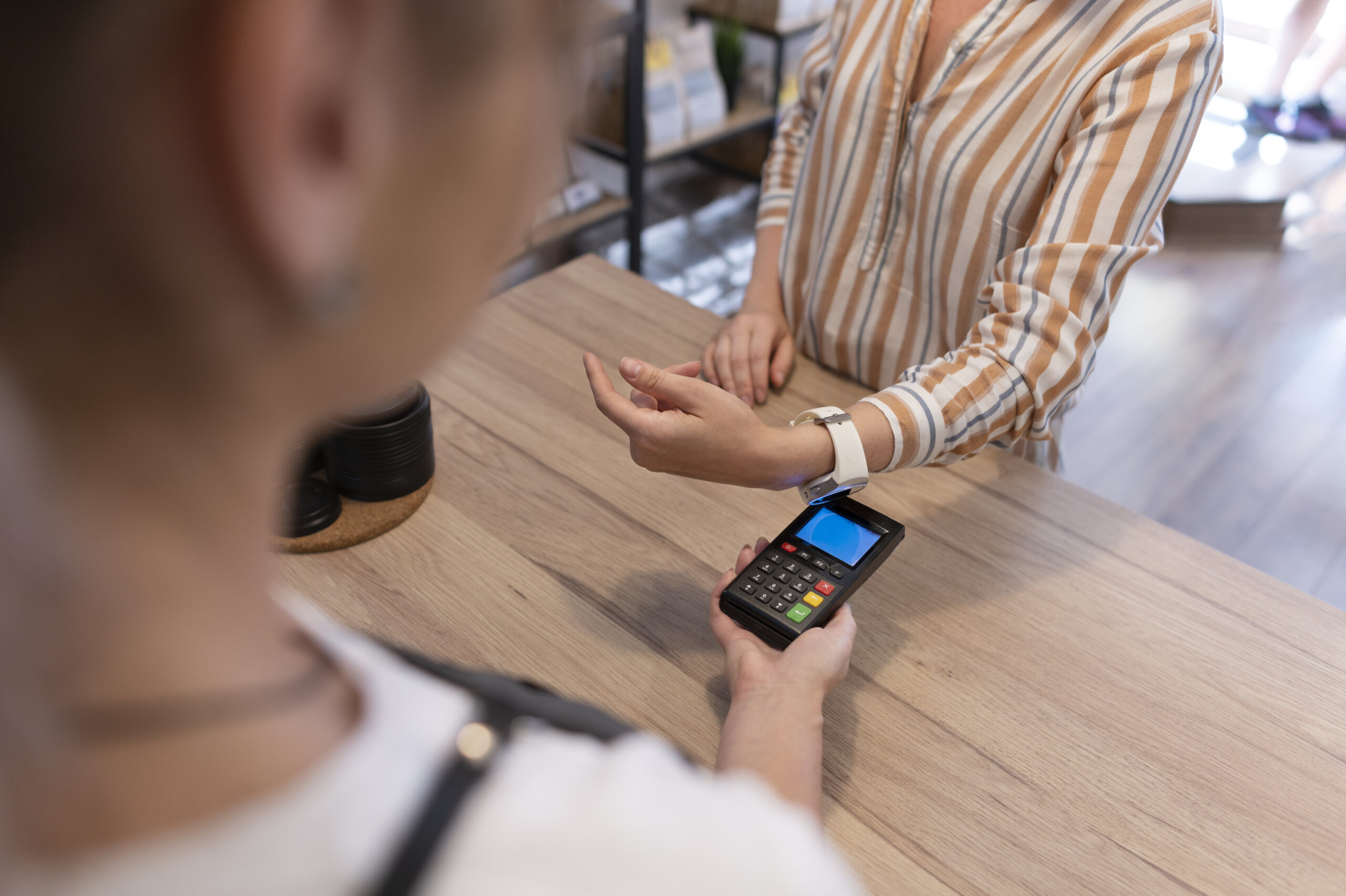 person-paying-with-its-smartwatch-wallet-app